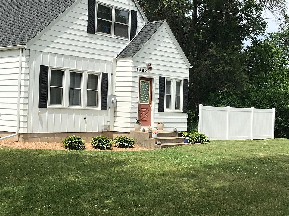 Front of home, the front porch is on the right side of the house