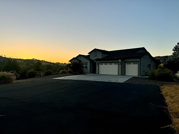 Outside "front yard" allows for extra parking, also an RV, a boat or even basketball court! The views are pretty spectacular as well.
