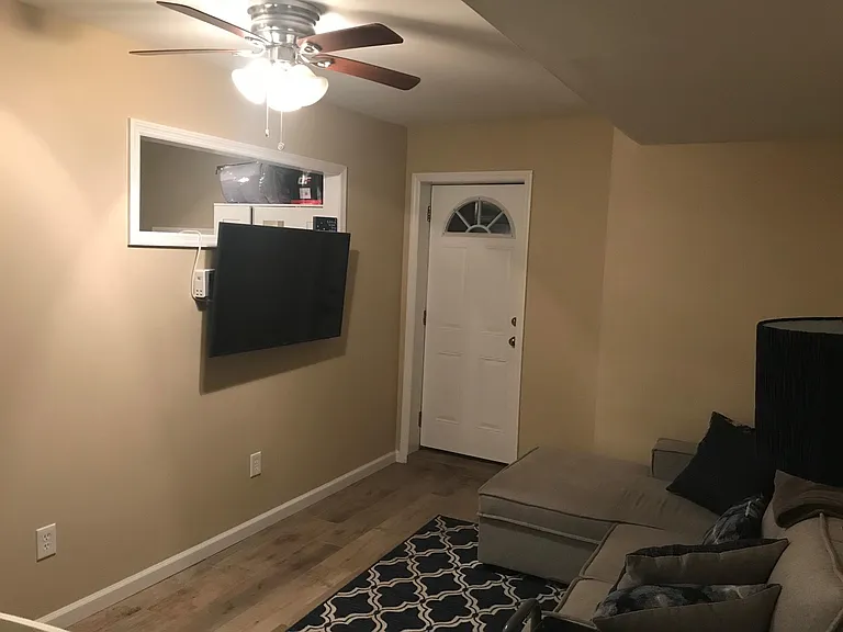 living room with ceiling fan