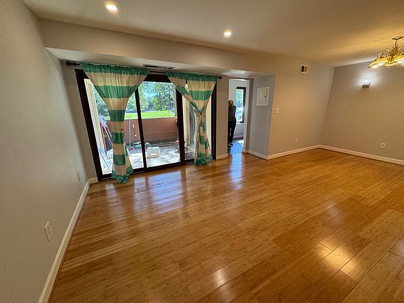 View to the balcony and kitchen from living room