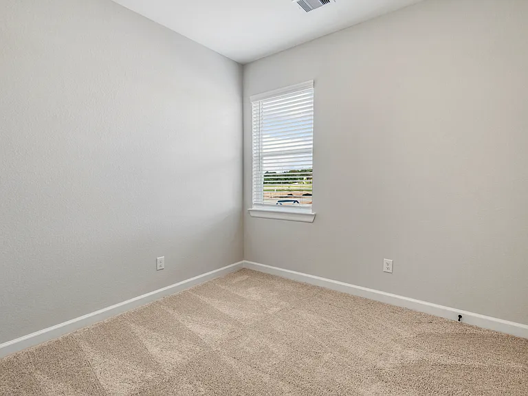 Bedroom with carpet flooring