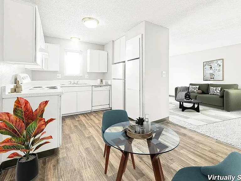 Chic virtually staged apartment featuring a cozy kitchen with modern appliances, stylish dining area, and inviting living room with elegant decor.