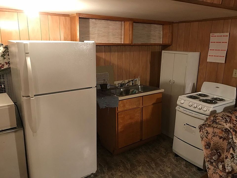 Kitchen with oven and fridge