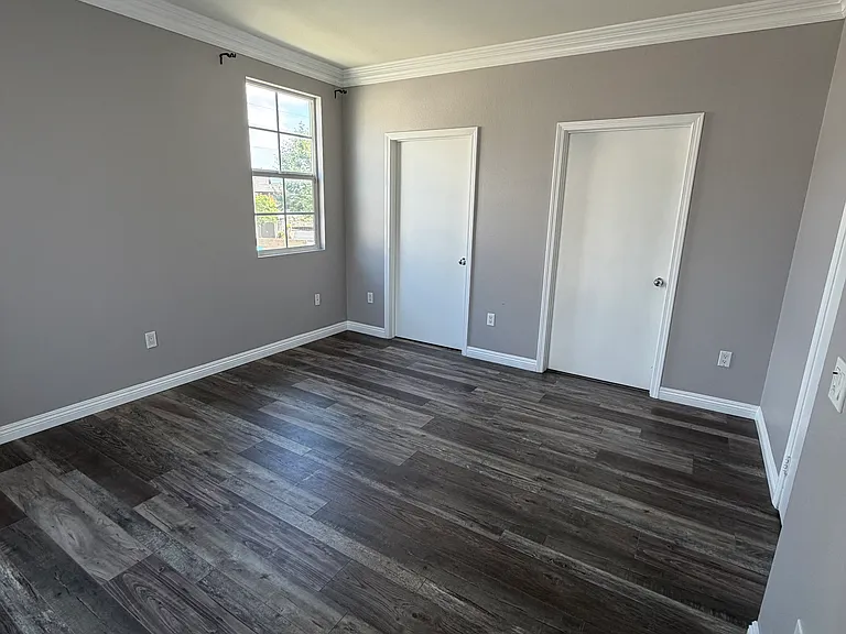 Primary bedroom includes walk-in closet and bathroom.
