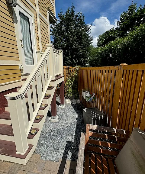 Stairs from living room to private patio.