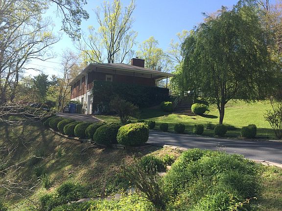 side view of home and 2nd drive way