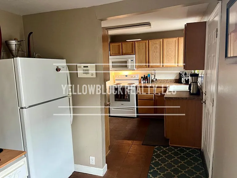 320 E 79th Ter — Photo 21