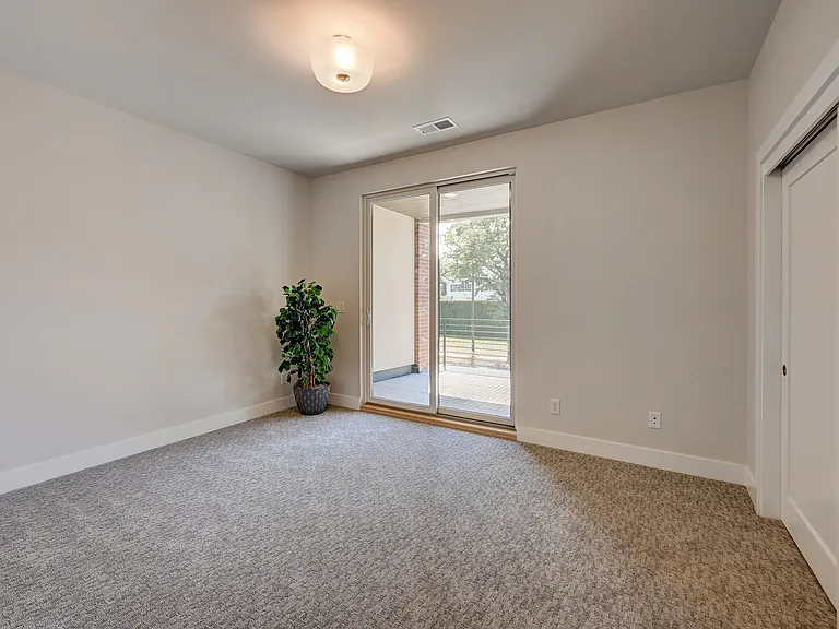2nd Floor Bedroom with Sliding Door to Deck