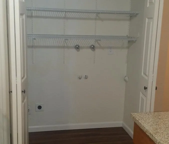 LAUNDRY CLOSET WITH STORAGE
