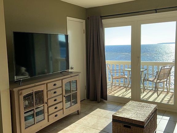 Tv and stand with gorgeous views of the Bay !!
