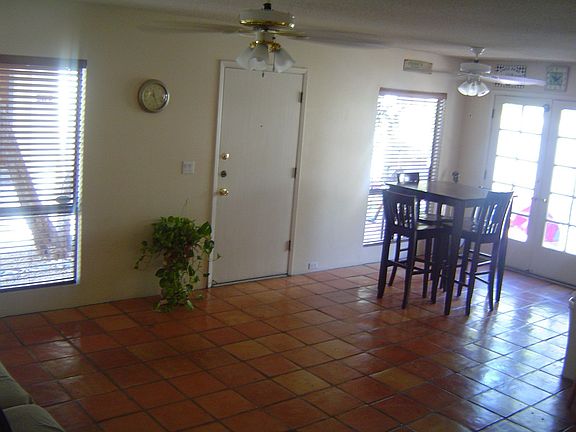 Living room is open, bright 