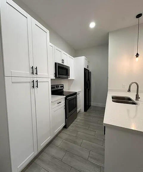 651 NE 60th Ave — Photo 13
