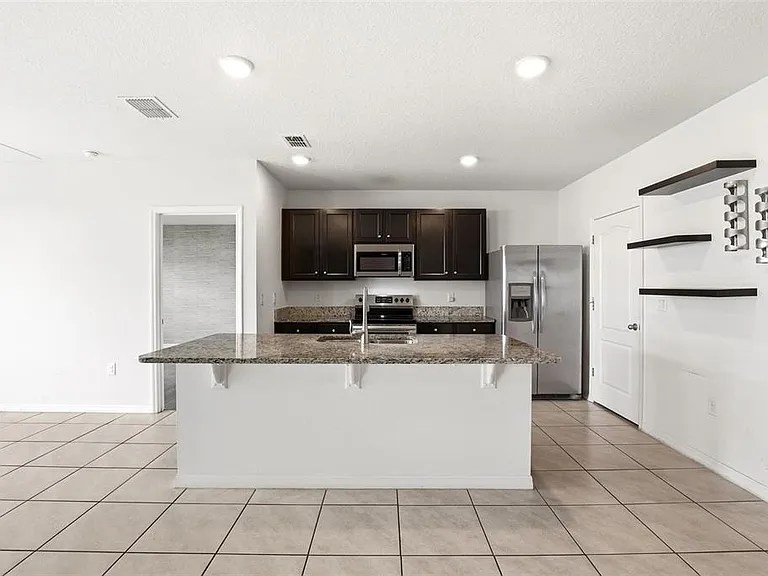 5636 Westerly Breeze Pl — Photo 16