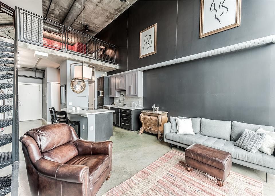 The entire first and second floor feature finished cement floors which are easy to maintain and look stylish! Cement ceilings & exposed pipes add to the lofty feel.