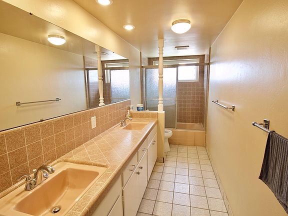 Guest bathroom with bathtub