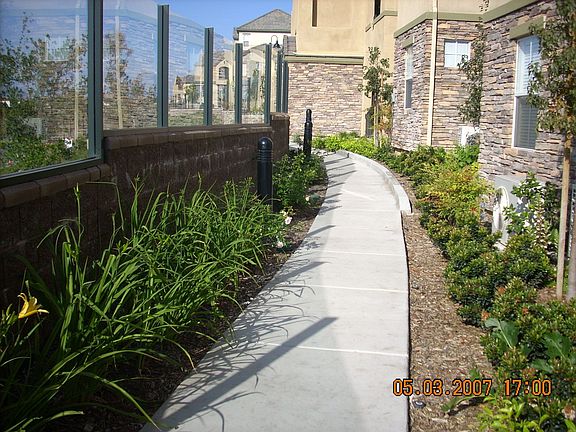 sidewalk in front of unit