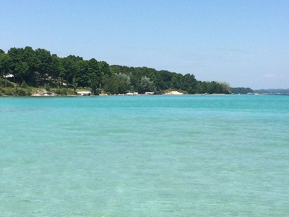 1st image of 5659 N West Torch Lake Dr