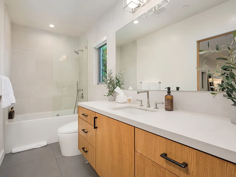 Let the spacious guest bathroom leave you feeling clean and relaxed.
