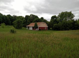 8707 N Hillman Rd, Six Lakes, MI 48886
