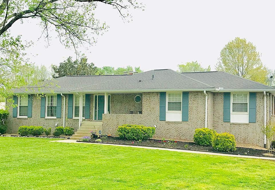 After exterior lighter brick