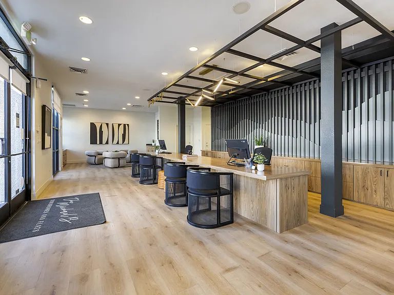 The office is thoughtfully arranged to create a comfortable, professional environment where visitors can easily get all the information they need.