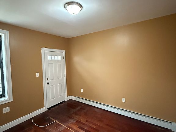 5th image of 931 E 213th St APT 2