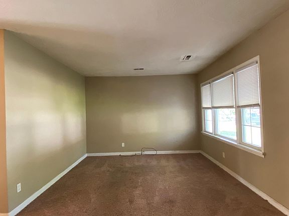 Living room with large windows 11.5 X 17