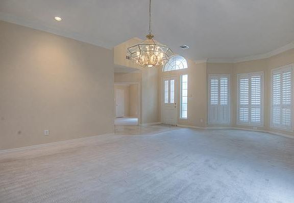 dinning area with tall ceilings
