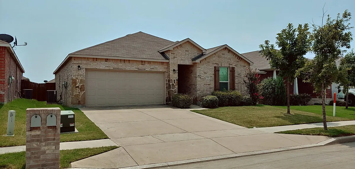 Front of the house, driveway and mailbox (right) - 2404 Lohani Ln