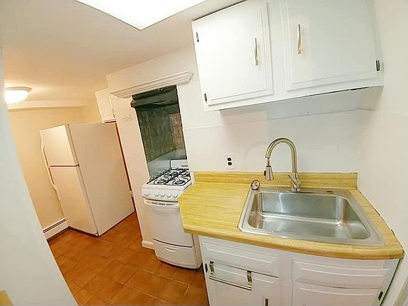 3rd image of 83 N Lawn Ave #Basement