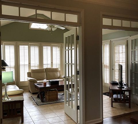 Living room open to sunroom