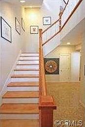 And be greeted by this open entry hall and beautiful hardwoo