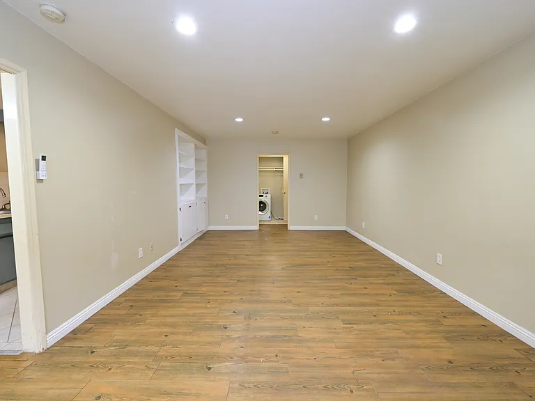 Fully Updated unit with In-unit Laundry, built-in cabinet, SS kitchen appliance + quartz countertop