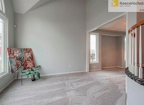 Tons of natural light. Formal living room enters to formal dining room.