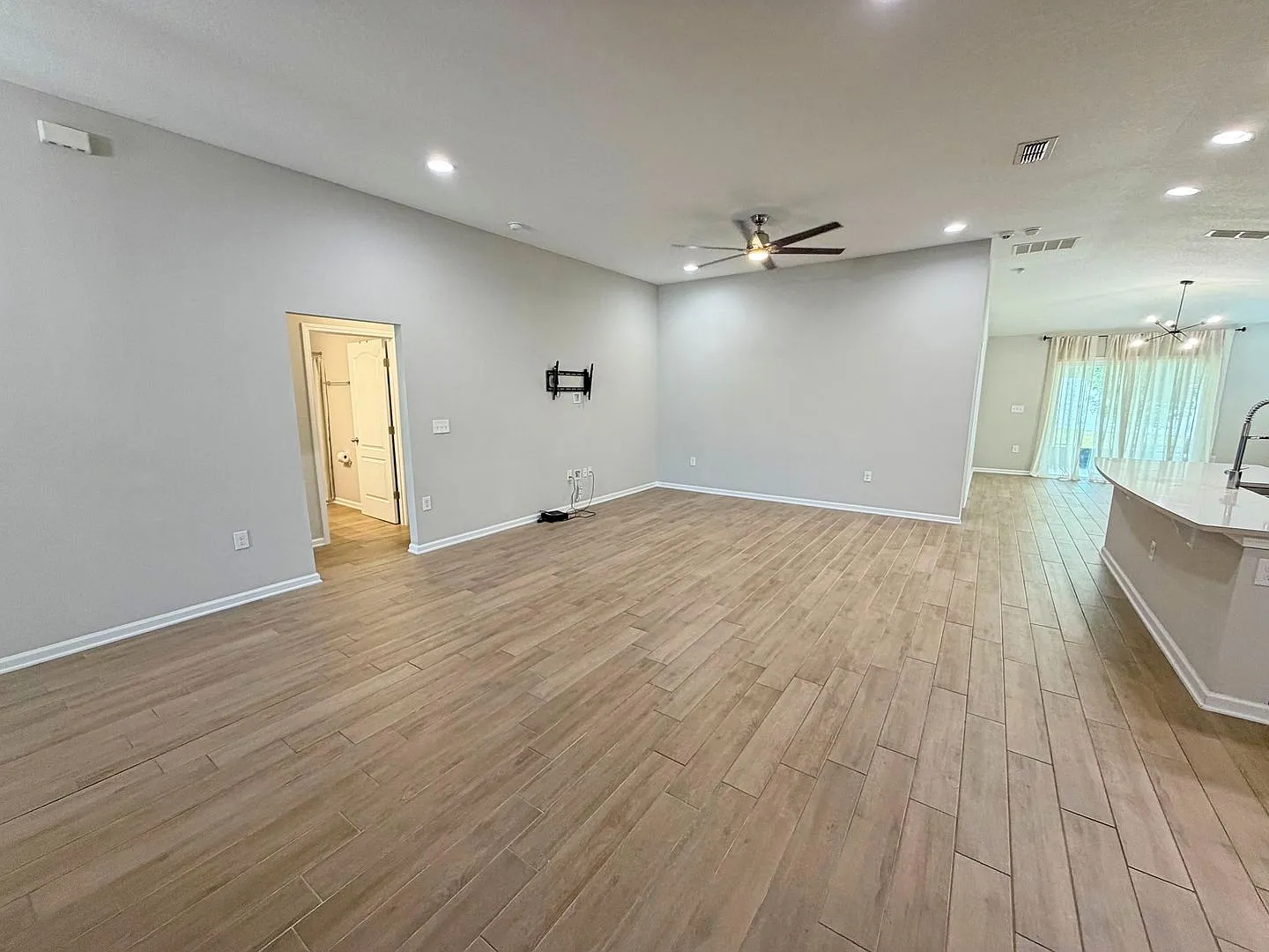 Spacious 4-bedroom, 2-bathroom home featuring an open-concept floor plan and a comfortable, moder... — Photo 4