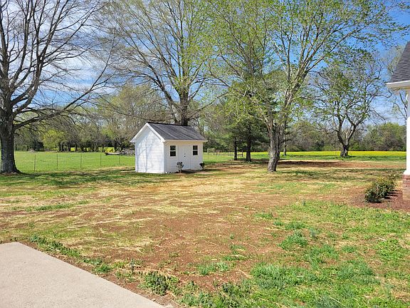 Storage shed located in backyard