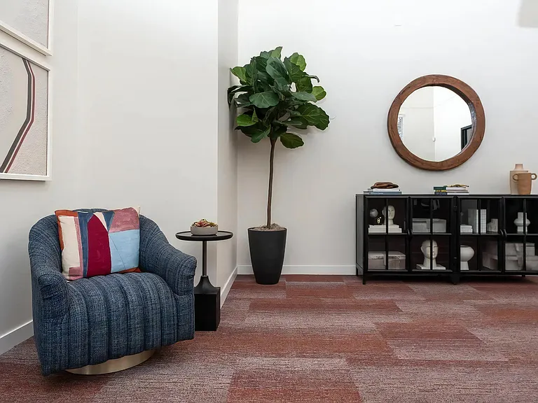 Relaxing Lounge Space with Reading Chair and Contemporary Console