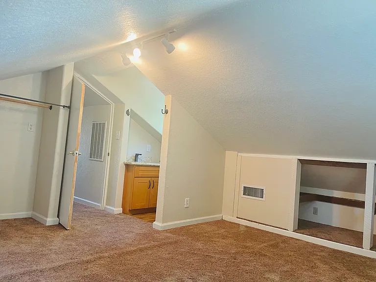 Upstairs bedroom with 1/2 bathroom
