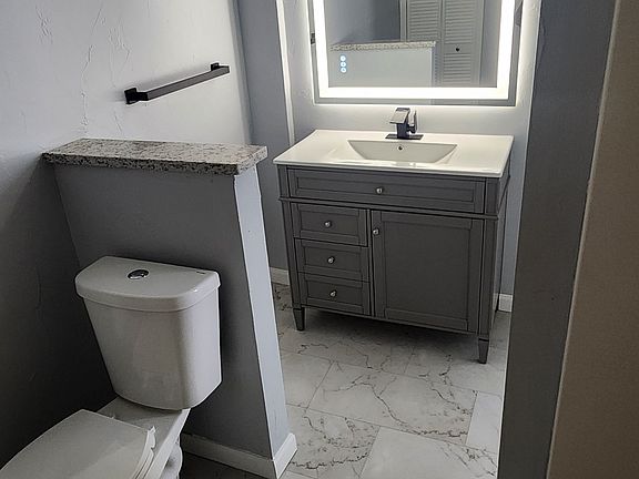 Full Bath on 1st floor. Shower over tub.