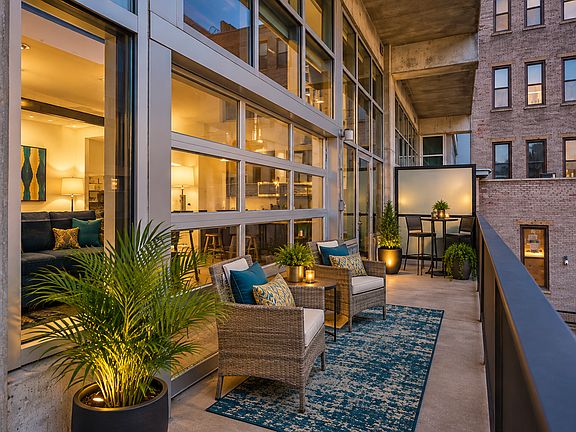 Large Balcony with Garage Door --Digitally Staged