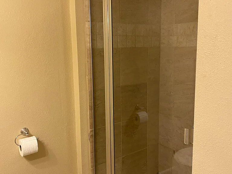 Lower level bathroom with stall shower
