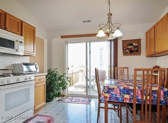 Kitchen view overlooks pond