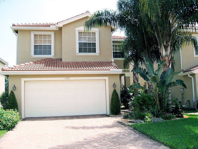 2-car garage, hurricane shutters
