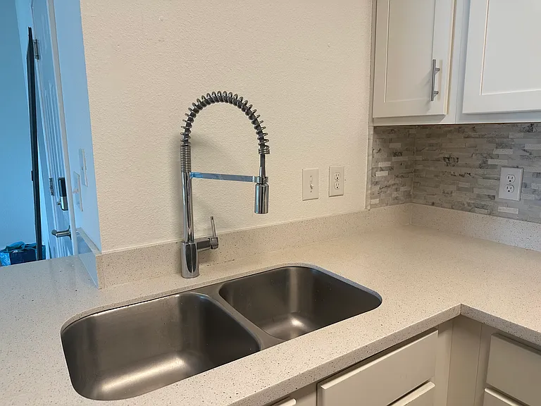 Modern faucet
Garbage disposal