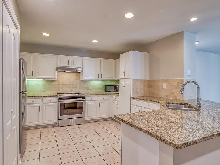 Modern renovated kitchen with elegant finishes