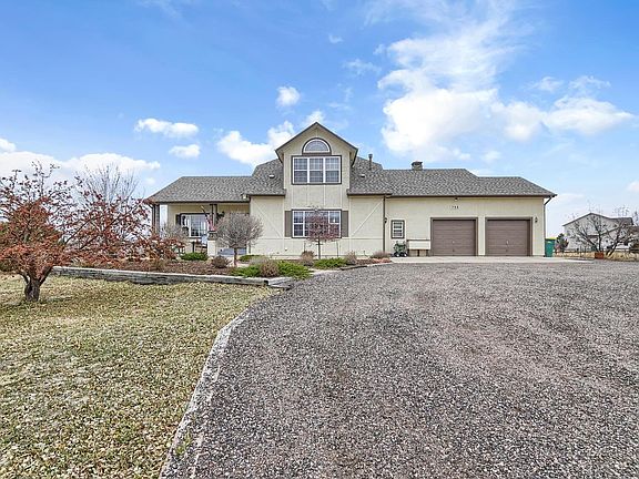Front of home. Private entrance is on the left.