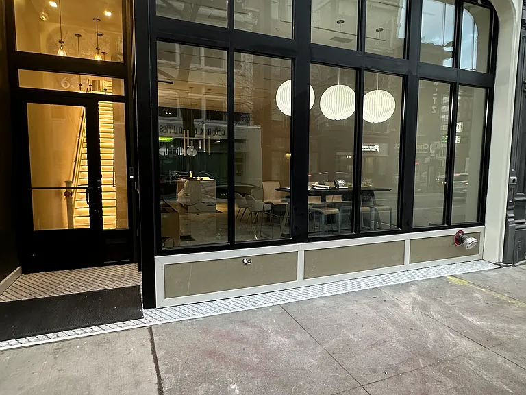 Suites are on 3rd/4th floors above law firm