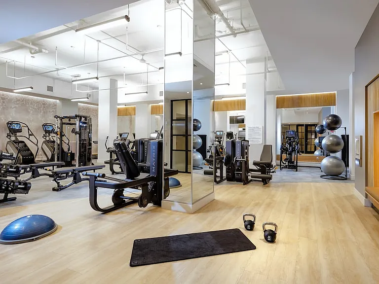 Expanded fitness center with cardio and strength equipment