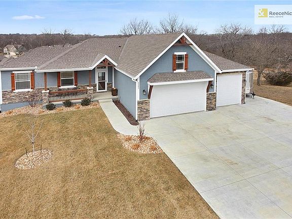 Fantastic Lot Allows For Wooded Views, Room For Expanded Garage & Parking Pad