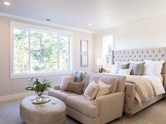 Generous-sized master suite boasts tree house like views